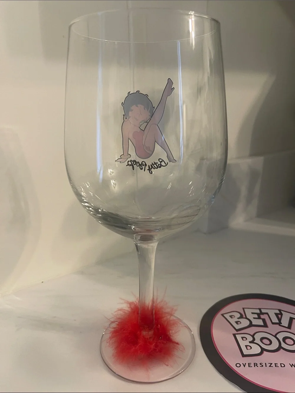 Betty Boop Clear Wine Glass with Red Artwork and Red Feather Base